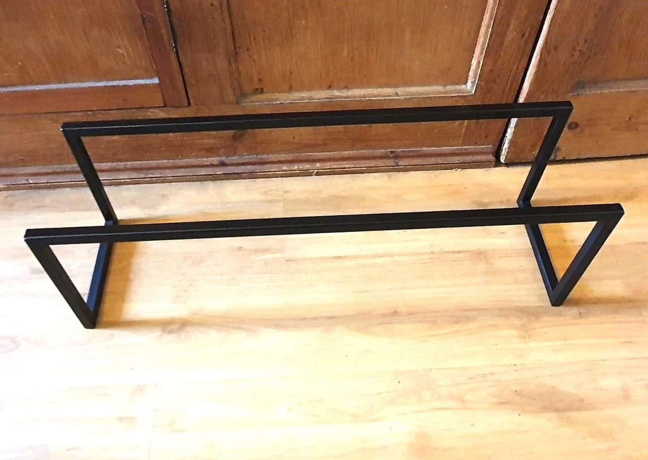 Modern steel shoe rack. Handmade and crafted in the UK