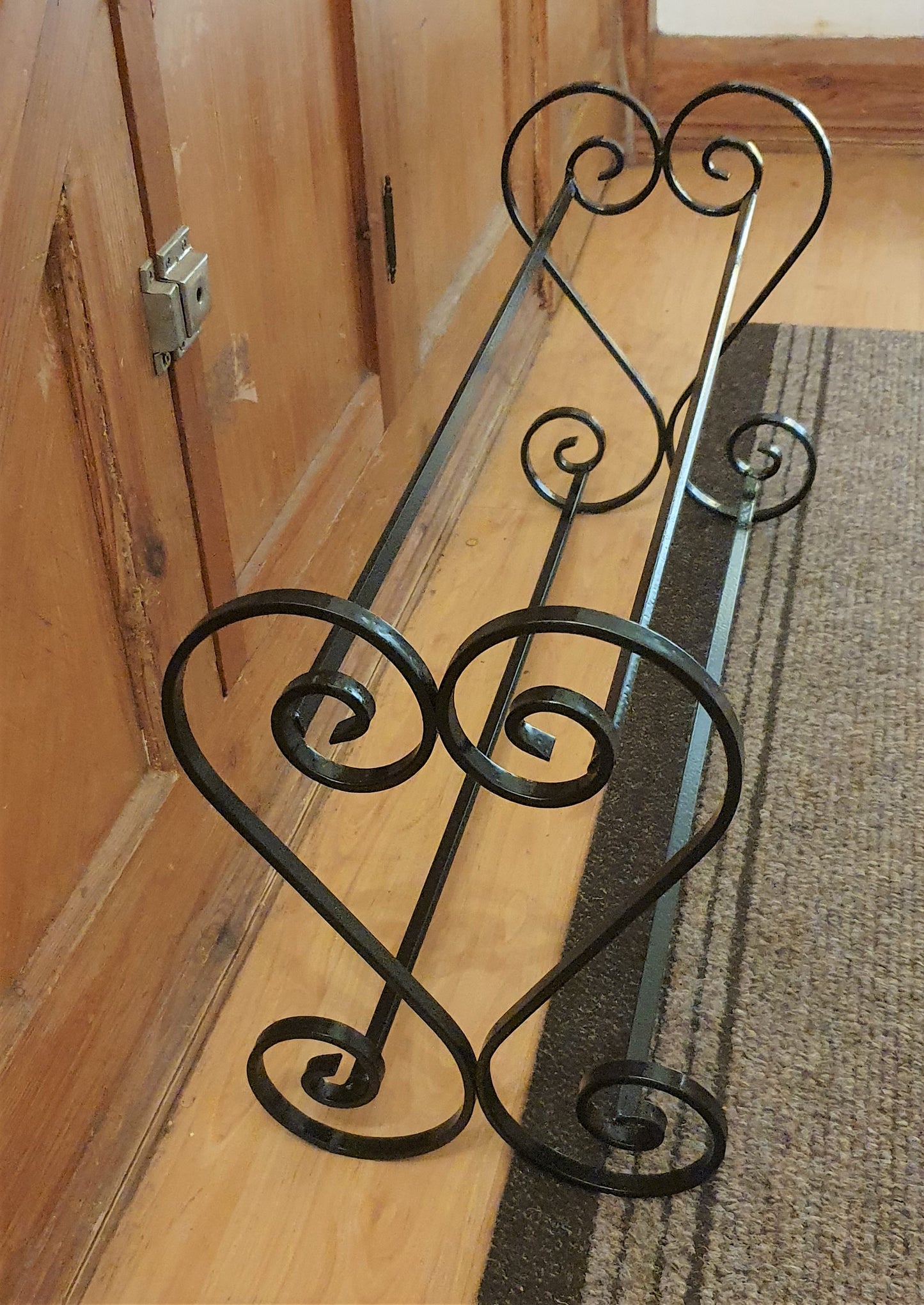 Wrought iron shoe rack. Heart-shaped. Handmade and crafted in the UK