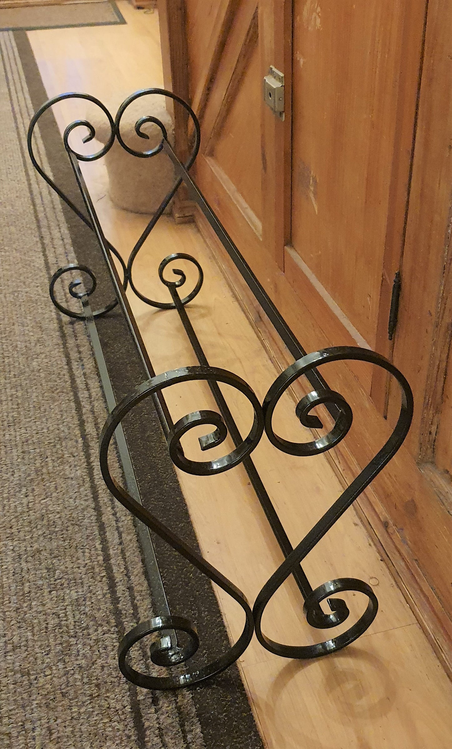 Wrought iron shoe rack. Heart-shaped. Handmade and crafted in the UK