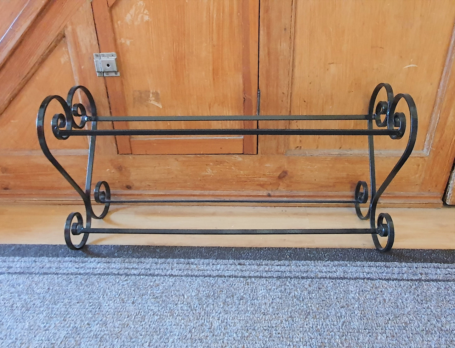 Wrought iron shoe rack. Heart-shaped. Handmade and crafted in the UK