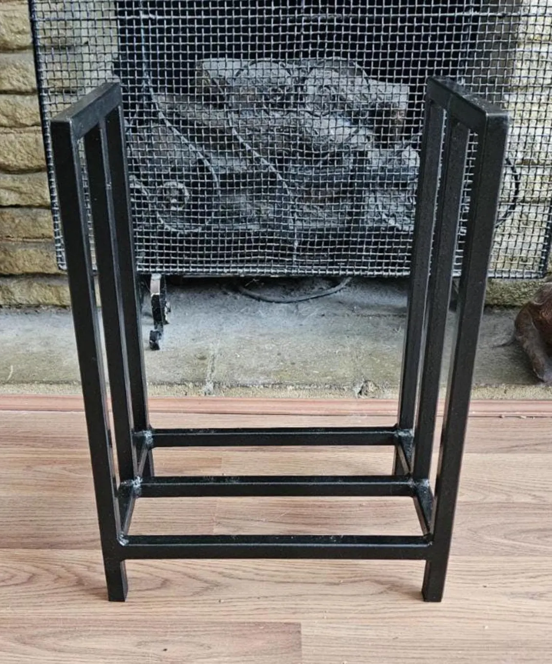 Minimalist steel log store. Handmade and crafted in the UK