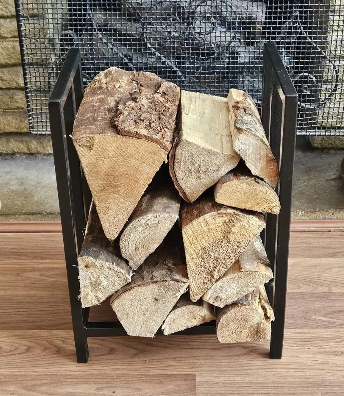 Minimalist steel log store. Handmade and crafted in the UK