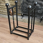 Traditional steel log store with twisted bar detailing. Handmade and crafted in the UK