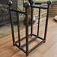 Traditional steel log store with twisted bar detailing. Handmade and crafted in the UK