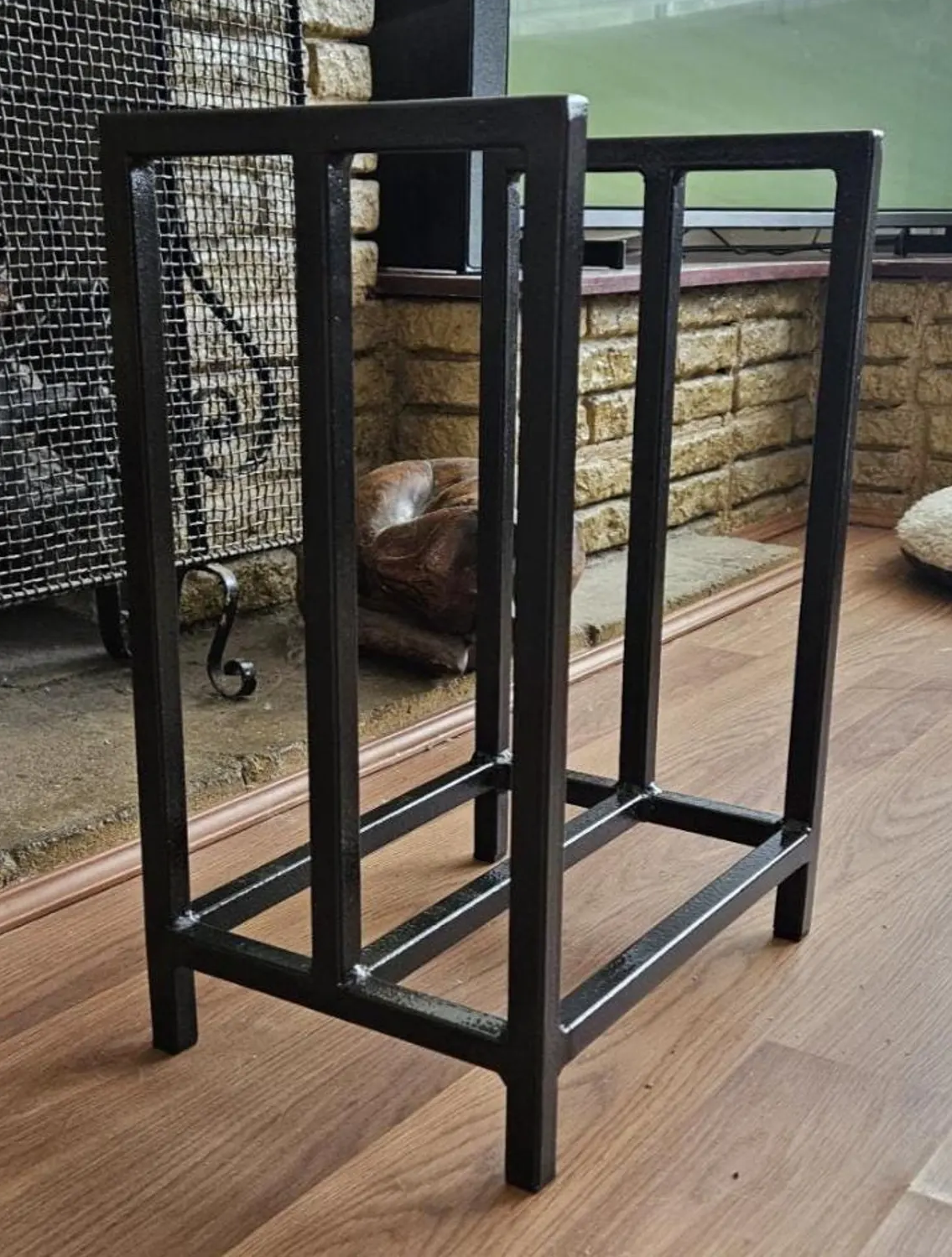 Minimalist steel log store. Handmade and crafted in the UK