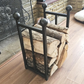 Traditional steel log store with twisted bar detailing. Handmade and crafted in the UK
