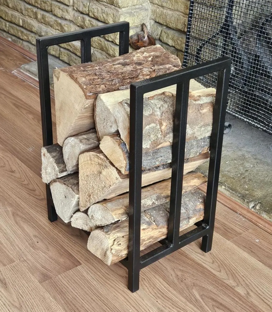 Minimalist steel log store. Handmade and crafted in the UK