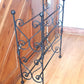 Four tier wrought iron shoe rack. Heart-shaped. Handmade and crafted in the UK