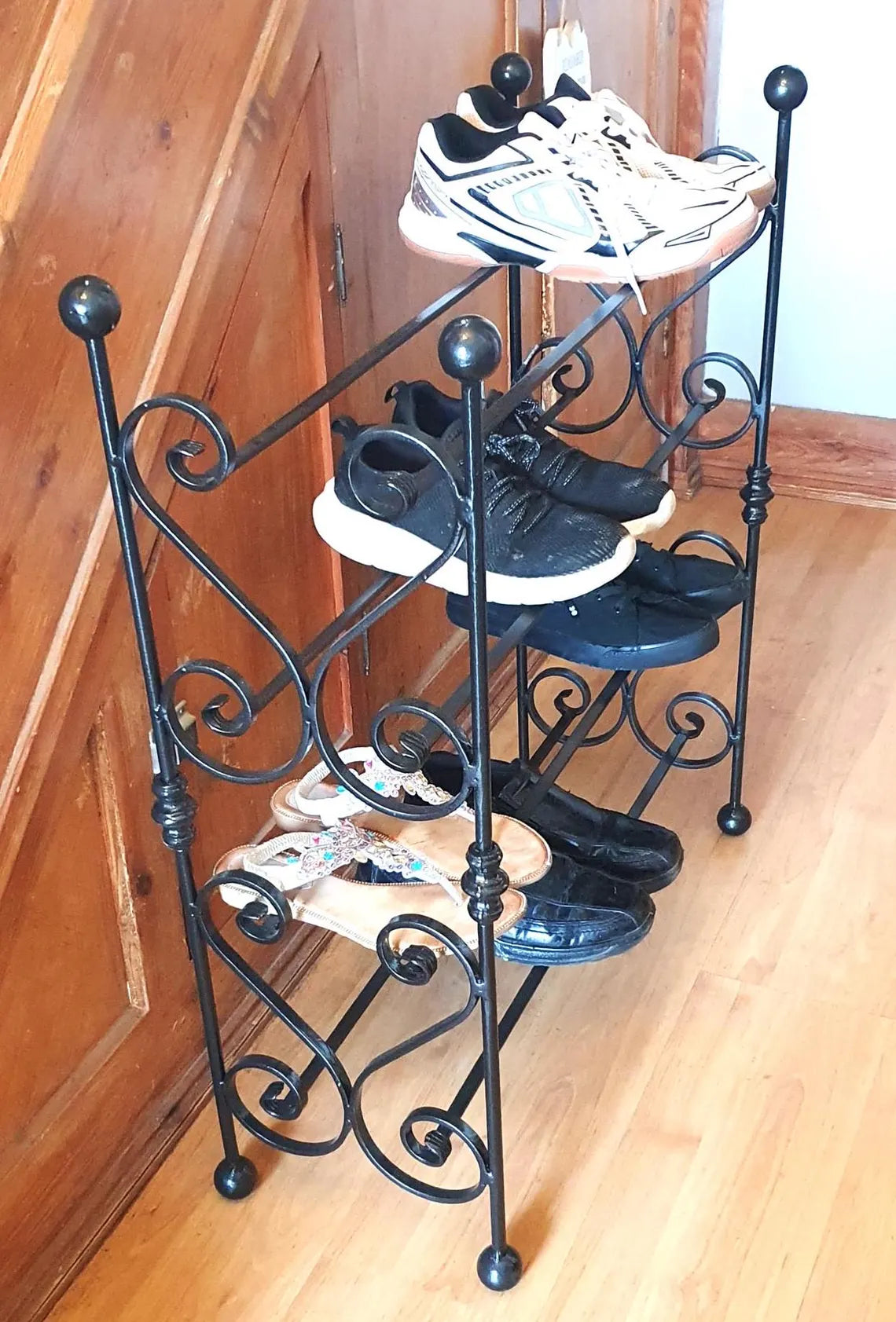 Four tier wrought iron shoe rack. Heart-shaped. Handmade and crafted in the UK